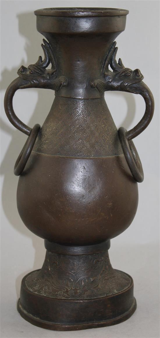 A large Chinese bronze hu vase, Yuan Dynasty, 38.5cm, foot mis-shapen